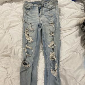 Light blue American eagle stretchy skinny jeans, gently worn